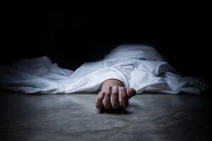 An Indian woman found dead in a field in Dhanusa