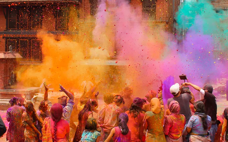 Holi festival is being observed with much fanfare in hilly areas