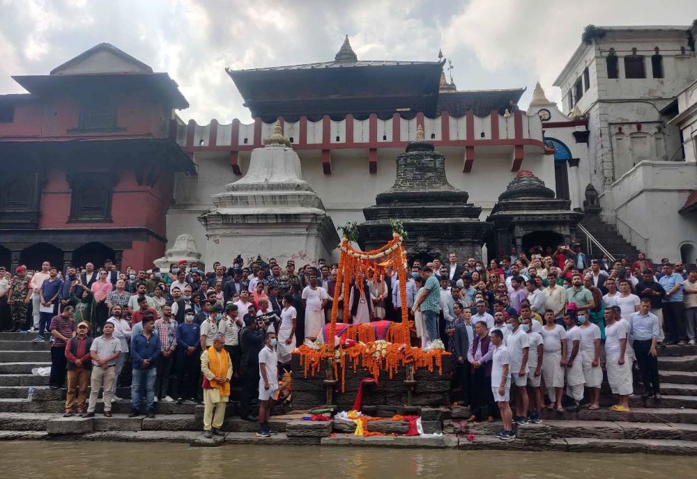 Sita Dahal cremated with state honors, PM Dahal and 2 daughters solemnly lit funeral pyre