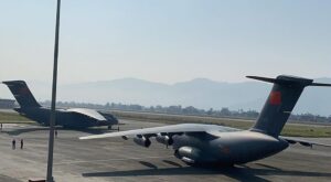 Two Chinese army aircraft, carrying relief aid for earthquake victims