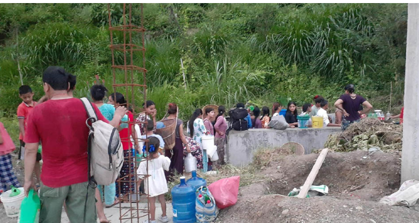 Hours in queue for a jar of water in Damauli