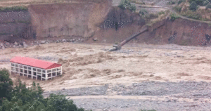 Flooded Lhende stream sweeps away Miteri Bridge