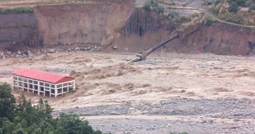 Flooded Lhende stream sweeps away Miteri Bridge