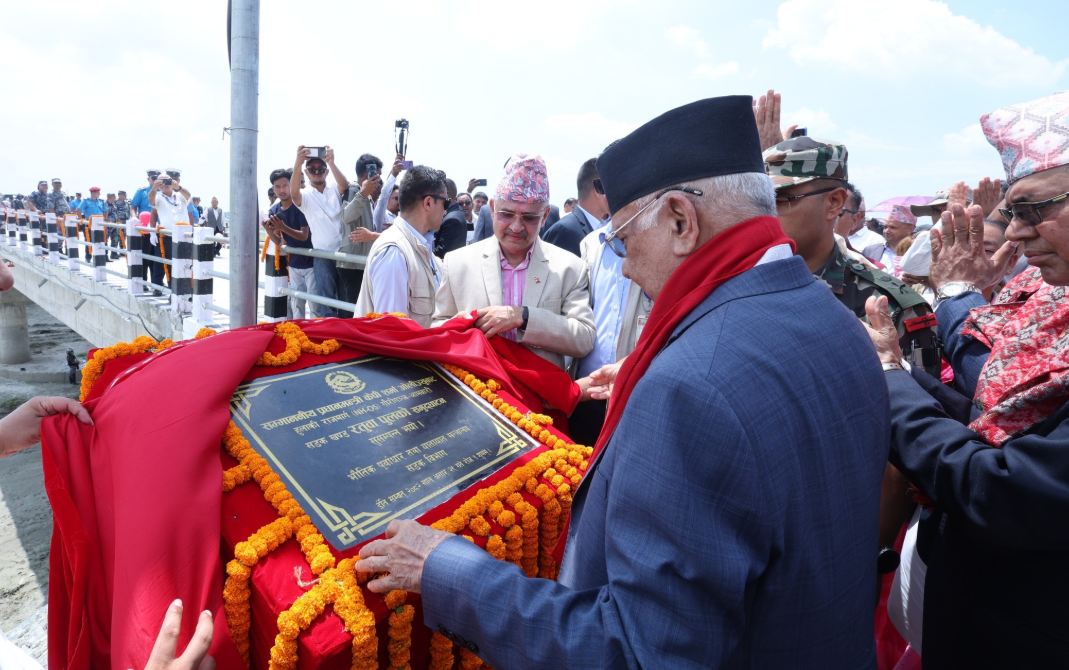 PM Oli inaugurates bridge along Postal Highway