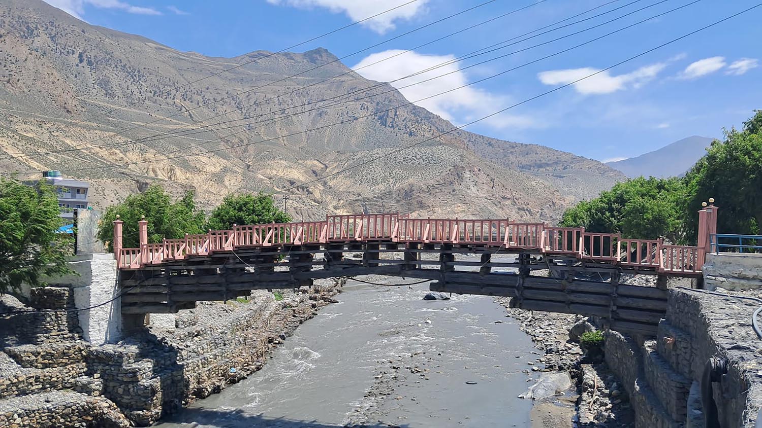 Scenic view of wooden bridge and surroundings in Jomsom